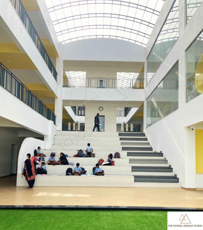 Climate-responsive school design at Pragati Vidyalaya, Challakere featuring skylit atrium and natural ventilation designed by The School Designs Studio