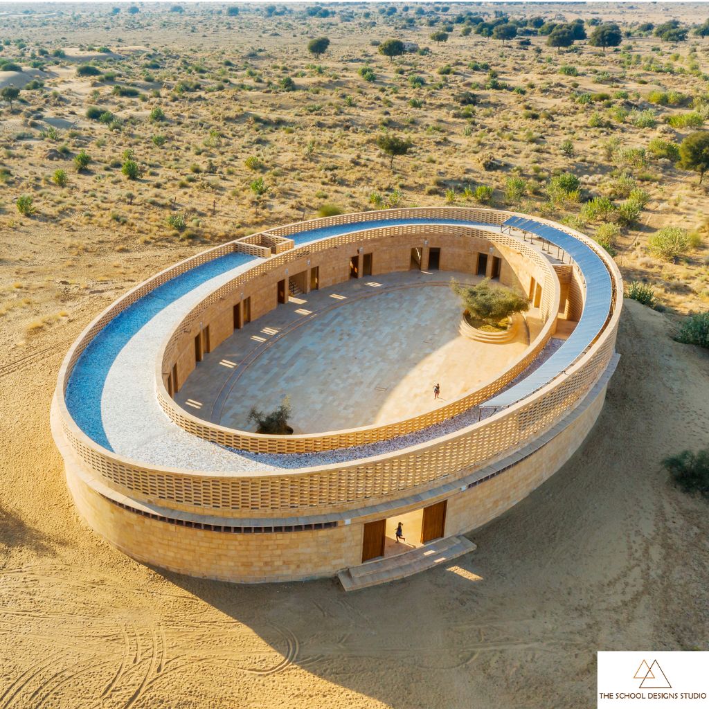 Aerial view of Rajkumari Ratnavati Girls’ School in Jaisalmer, Rajasthan showcasing oval school architecture.